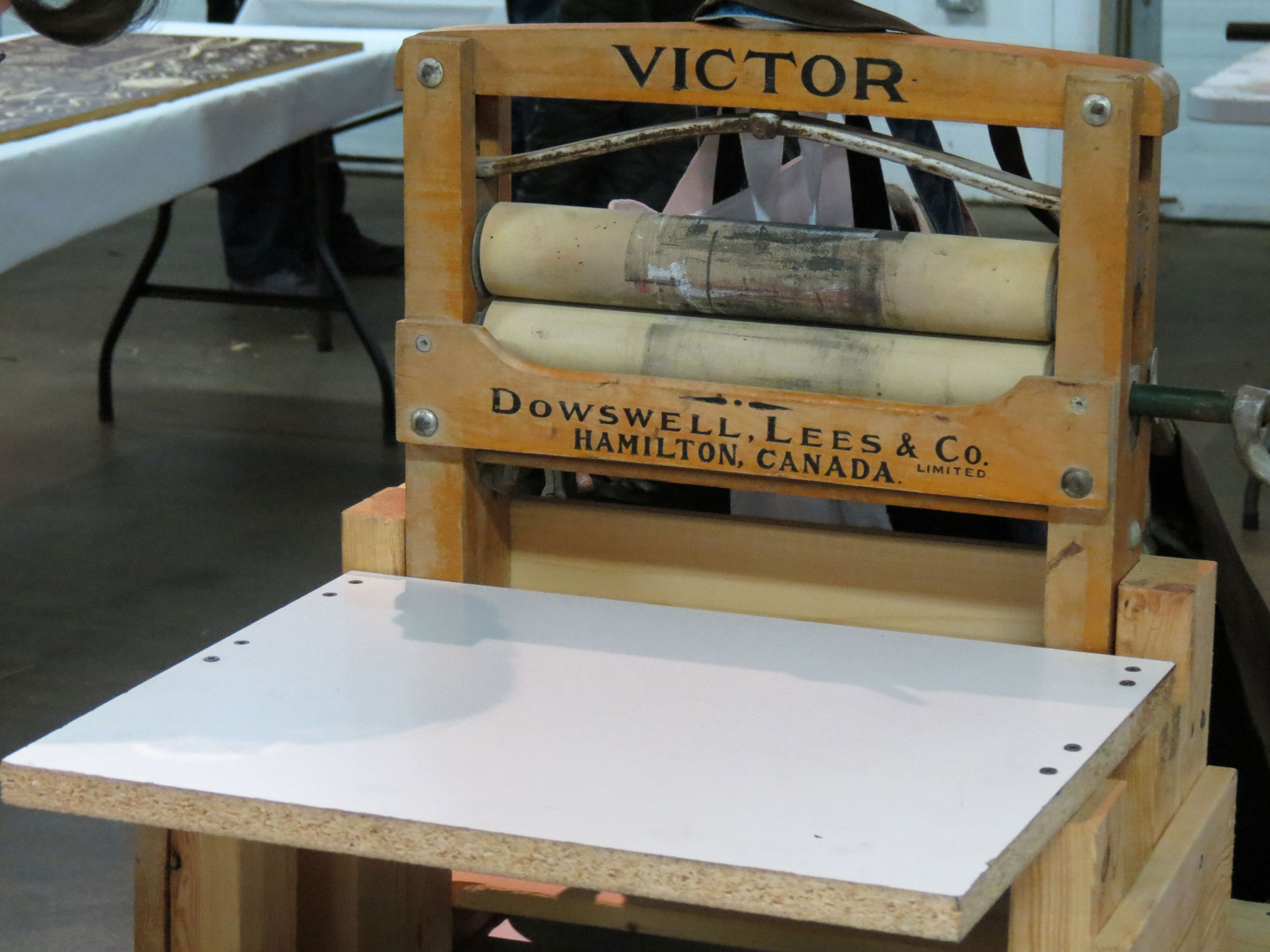 A wringer washer turned mini-printing press used in outreach workshops.