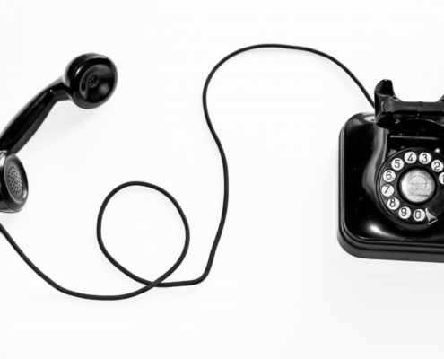 Black rotary telephone