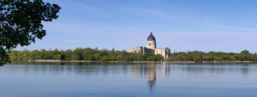 Sask Legislative building with Wascana Lake in the foreground.