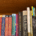 colour photo of books on a shelf, all by Canadian author David Robertson