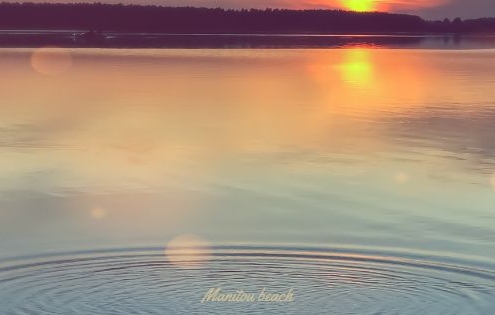 Shores of Manitou Beach at dusk. Shows ripples in the water