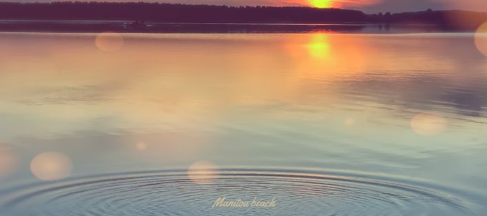 Shores of Manitou Beach at dusk. Shows ripples in the water