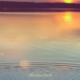 Shores of Manitou Beach at dusk. Shows ripples in the water