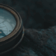 Compass laying on rocks