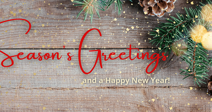 Season's Greetings written in red text with green pine cones in the background