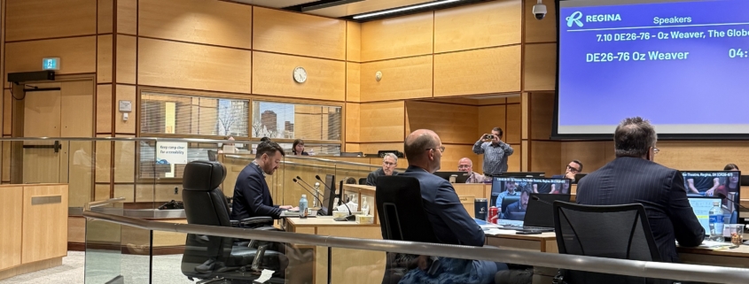 A view of Regina City Council Chambers from the gallery, looking towards council and Oz Weaver, Globe Theatre CEO, presenting at Regina City Council.