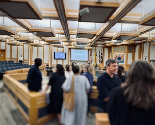 People gather in the Saskatoon City Council Chambers following the August 12, 2026, Governance and Priorities Committee meeting on the City’s Public Art Policy.